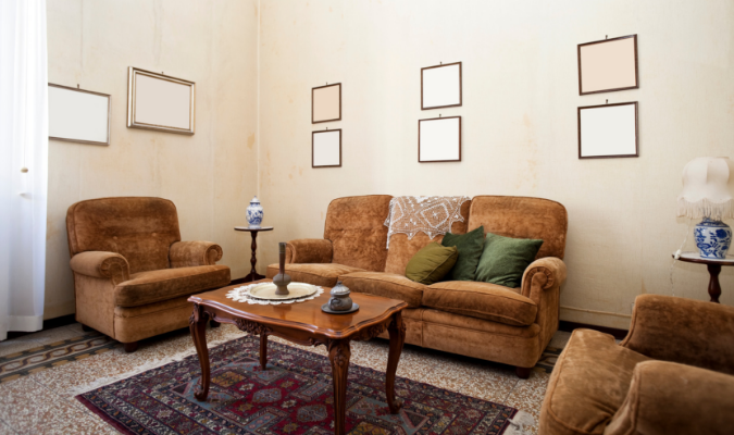 Brown suede sofa with old fabric