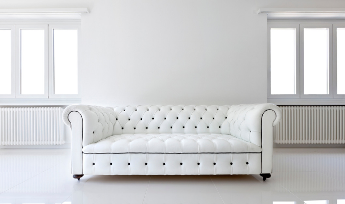 Pristine white leather sofa deep conditioned