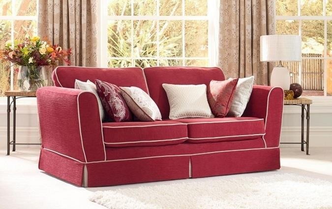 Red sofa with white trim